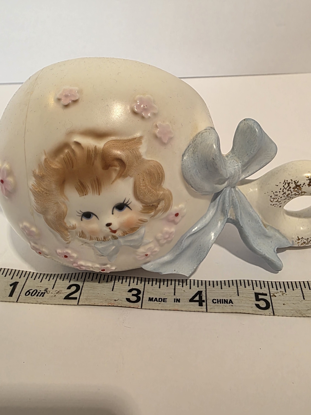 vintage Napcoware baby rattle-shaped planter